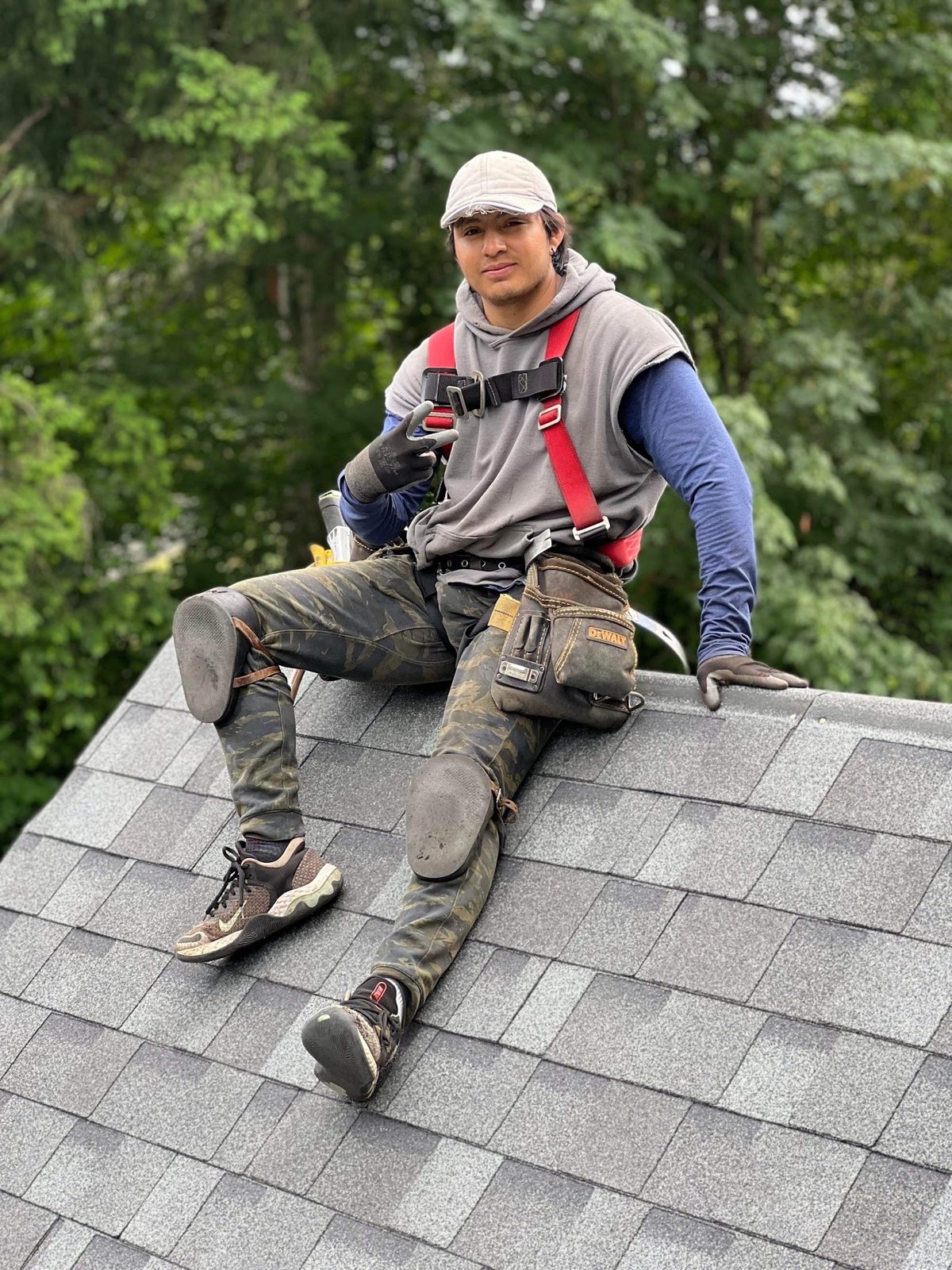 J&Y Roofing crew member on a finished architectural shingle roof